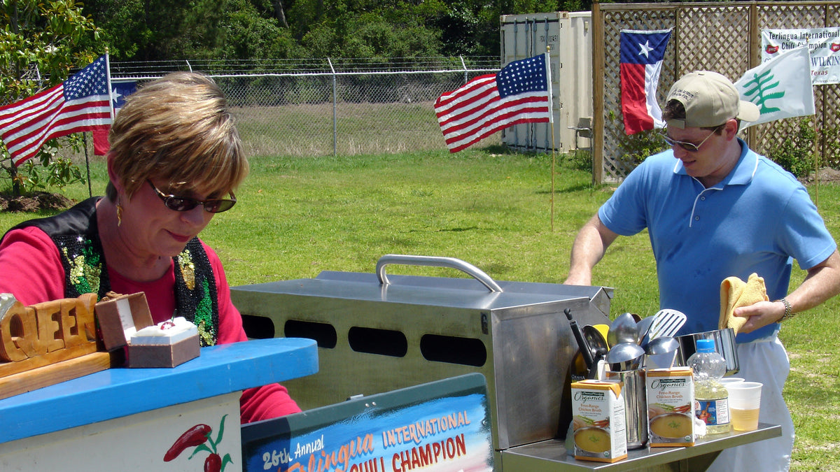 Cindy Reed Wilkins cooking her championship chili during the Food Network Throwdown with Bobby Flay