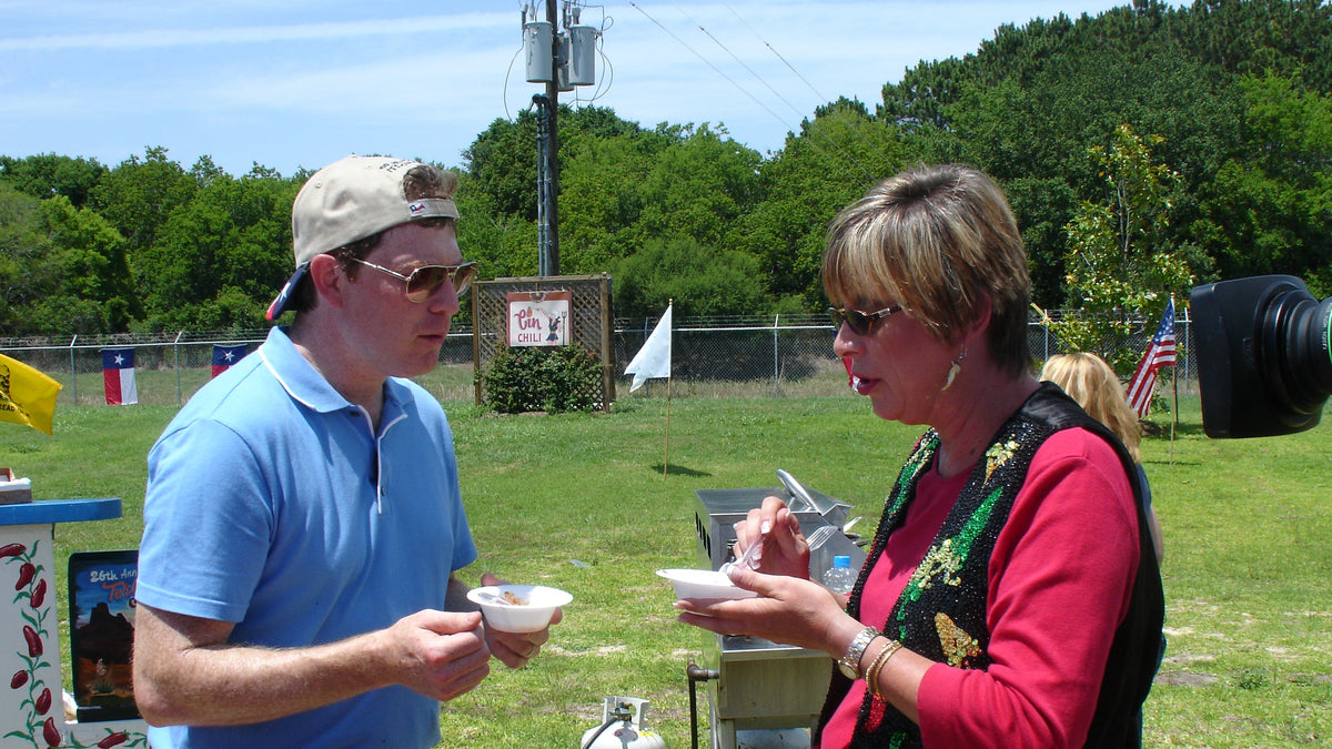 Cindy Reed Wilkins and Bobby Flay during the Throwdown chili challenge filming