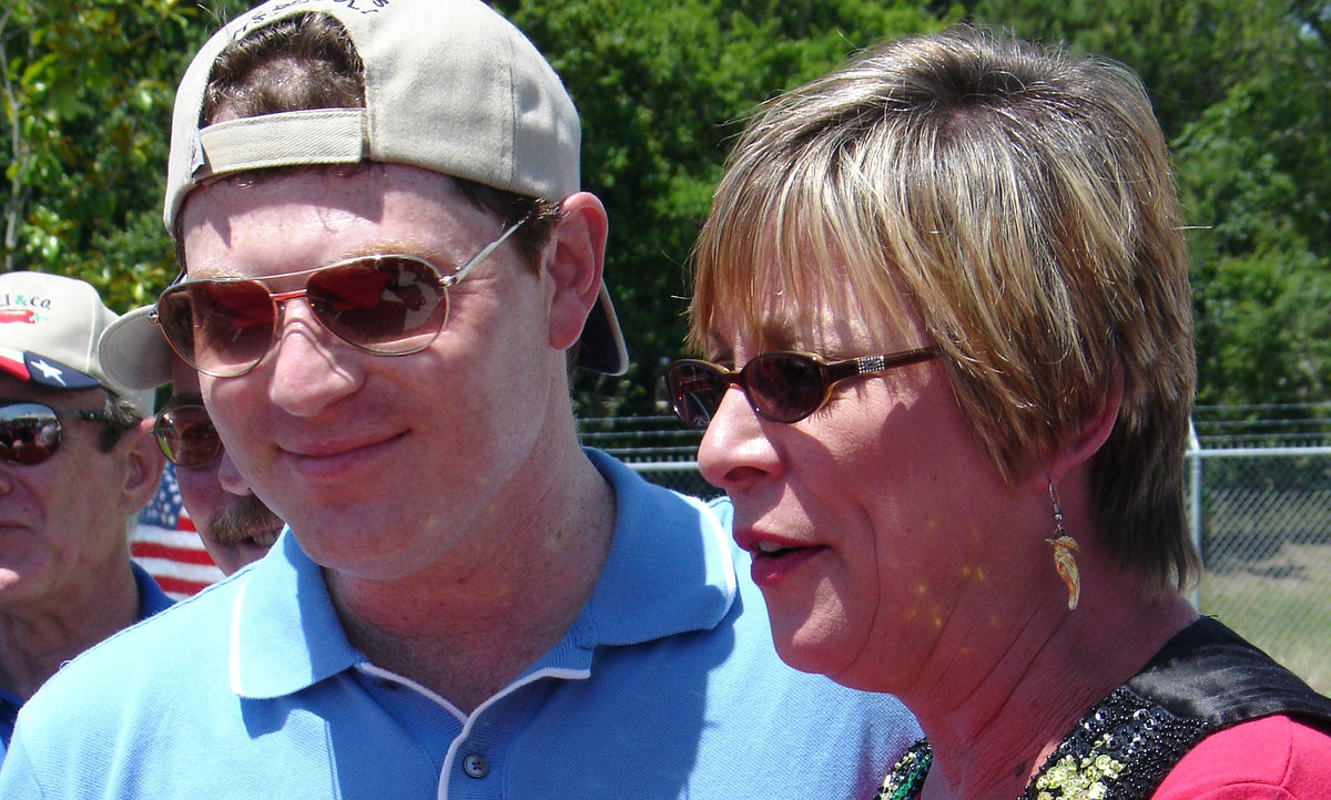 Cindy Reed Wilkins of Cin Chili & Company with Bobby Flay on the Food Network Throwdown chili episode
